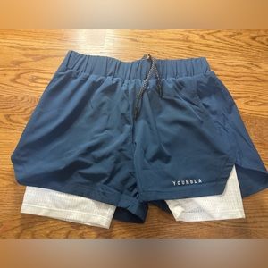 Men's never worn navy blue athletic shorts / Young LA branding